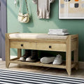 Multifunctional upholstered storage bench with two drawers and a shoe rack.
